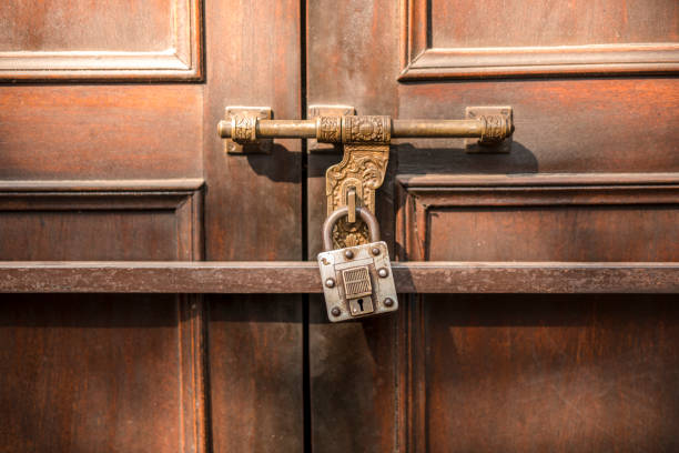 istock Closed Wood Door with lock 928882444