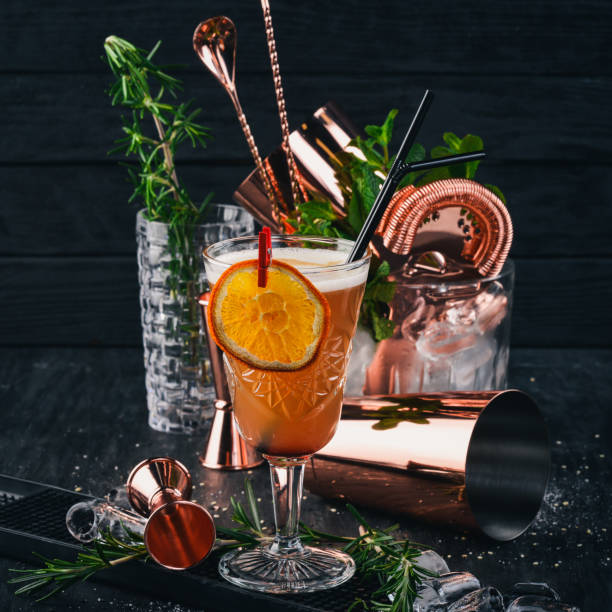 istock Alcohol Cocktail Mai Thai. On a black wooden background. 928882660