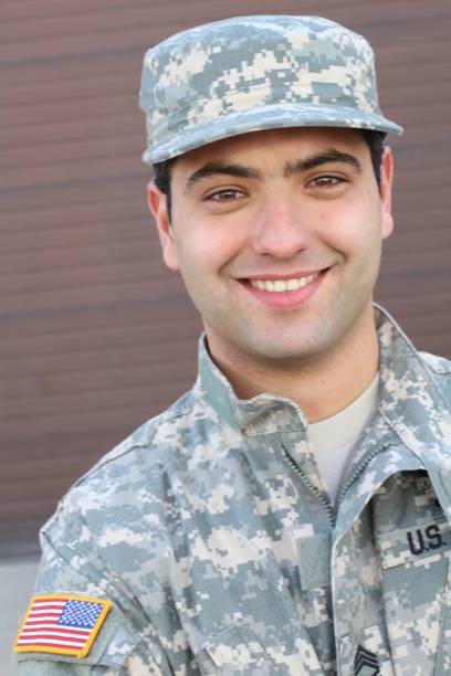 istock Soldier smiling close up isolated 928890210