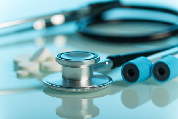 istock The medical device is phonendoscope for diagnostic purposes, on blue 928890308