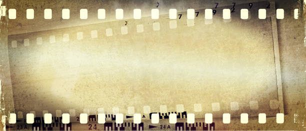 istock Grunge double film strip frame in sepia tones. 928890650