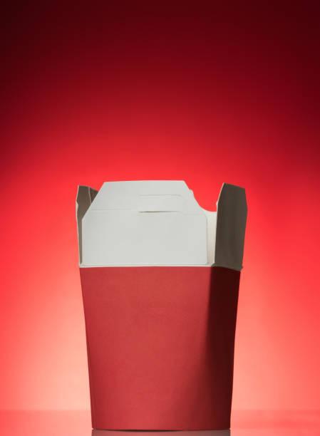 istock Special wok box for ready-made fast food packaging, on red background 928891022