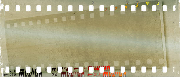 istock Grunge double film strip frame in sepia tones. 928893988