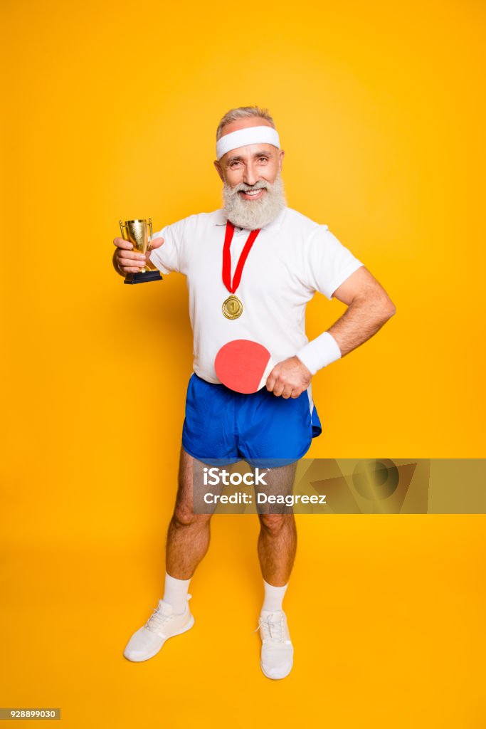 Competetive cool healthy modern successful active grandpa with table tennis equipment. Healthcare, weight loss, bodycare lifestyle, motivation, activity, pride, hobby Table Tennis Stock Photo