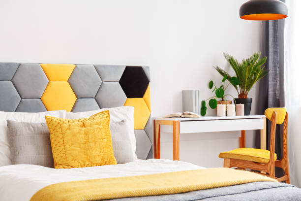 istock Bright bedroom with wooden desk 928905752
