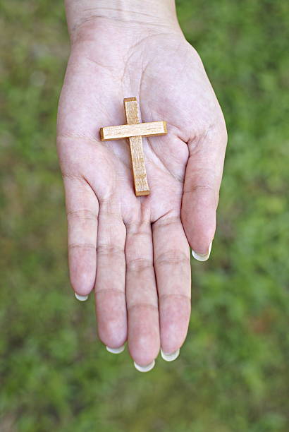 istock Wooden cross in hand 92890814