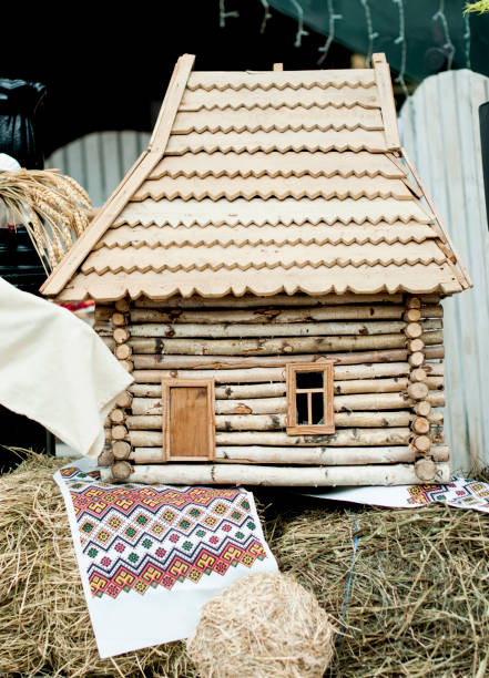 istock small wooden house for decoration with national attributes 928909746