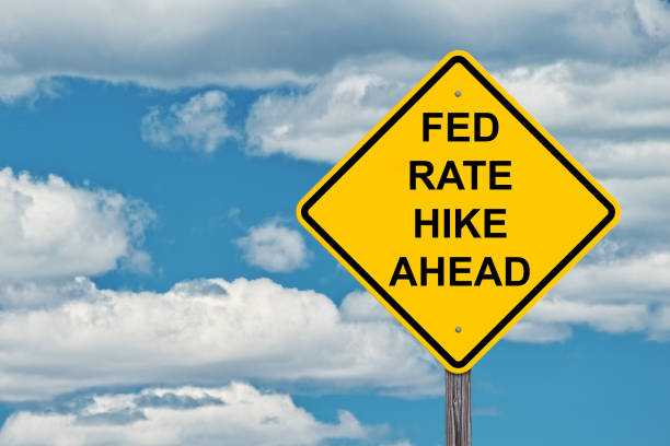 istock Fed Rate Hike Ahead - Caution Sign Blue Sky Background 928913562