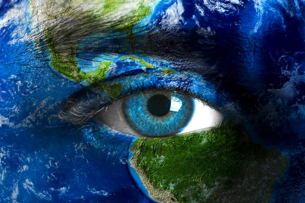 istock Planet earth and blue human eye 928913944