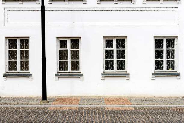 istock Luxurious old apartament house with a white facade 928914036