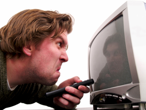 a man changing the TV channel isolated on white.