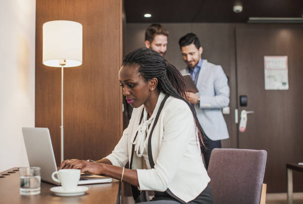 istock Business People Working at a Hotel Room 928917022