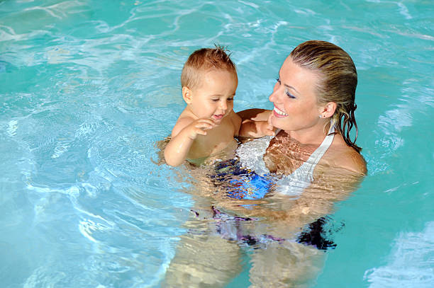 istock Mother and Child in Swimming Pool 92891831