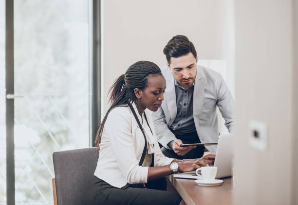 istock Business People Working at a Hotel Room 928918684