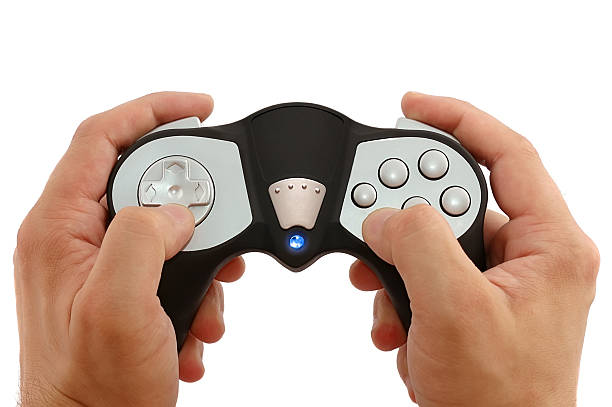 Cтоковое фото Руки человека с Игровой контроллер на белом