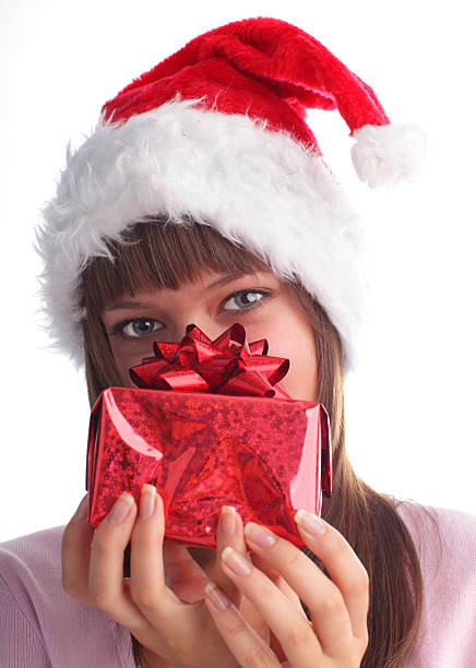 istock Woman in Christmas cap with gift 92892389