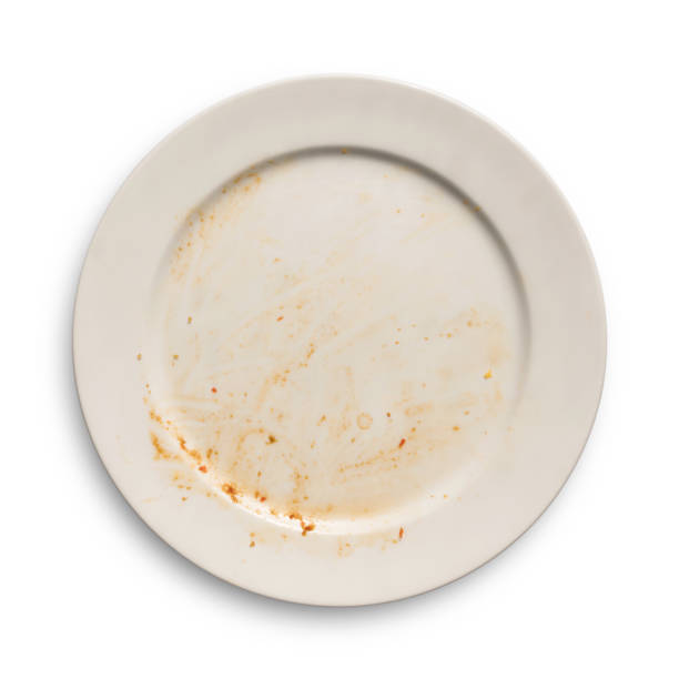 istock Top view of empty plate, dirty after the meal is finished isolate. 928925874