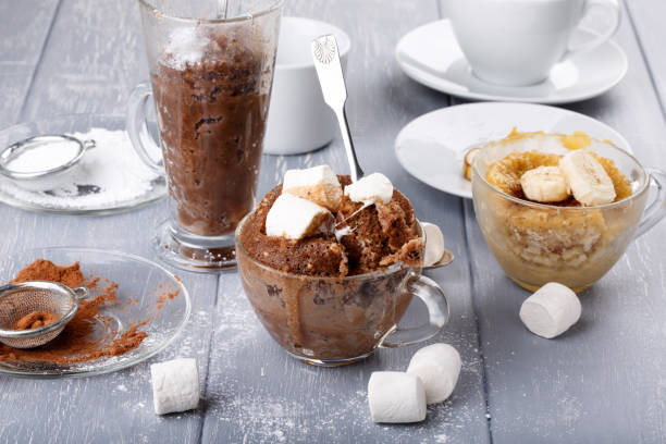 istock Quick chocolate cake with marshmallow in a glass mug from microwave 928930086