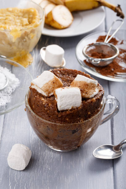istock Quick chocolate cake with marshmallow in a glass mug from microwave 928930166