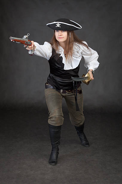 istock Pirate girl rush to the attack with gun 92893762