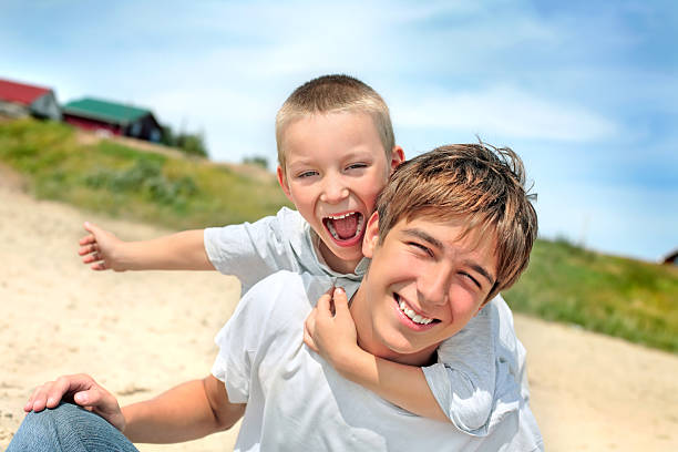 istock happy teenager and kid 92893798