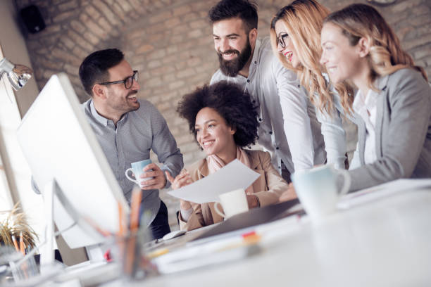 istock Business coworkers discussing new ideas in modern office 928951628