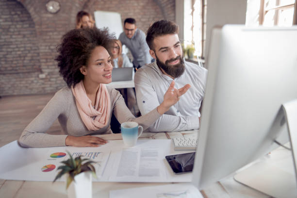 istock Business coworkers discussing new ideas in modern office 928951766