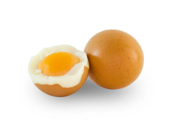 Close-Up Of Boiled Eggs Against White Background Photo Taken In Chiang Rai, Thailand boiled egg cut out stock pictures, royalty-free photos & images