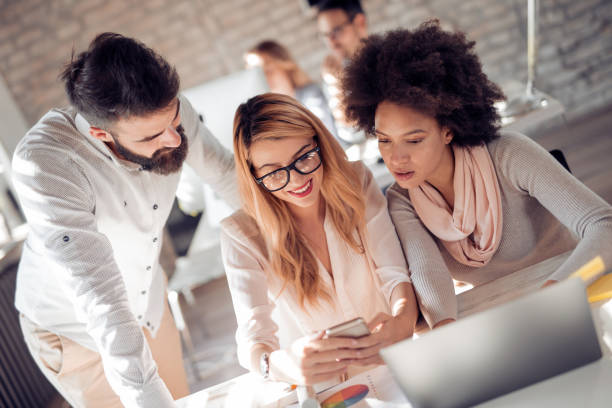 istock Business team sitting in office and planning work 928953558