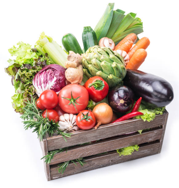 istock Fresh multi-colored vegetables in wooden crate. 928956296