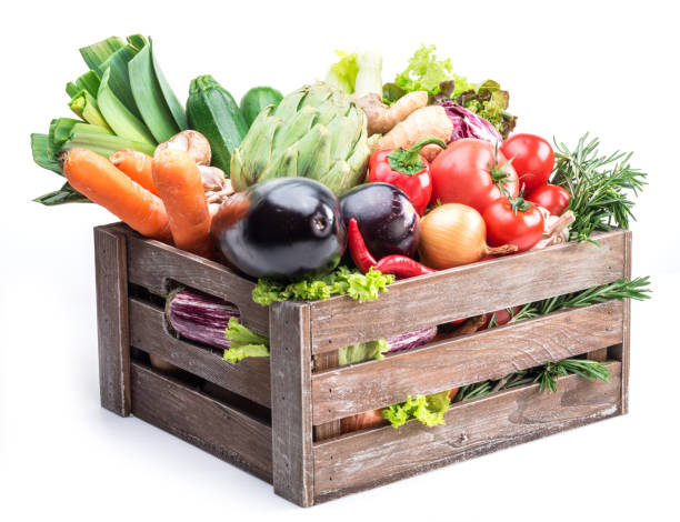 istock Fresh multi-colored vegetables in wooden crate. 928956434