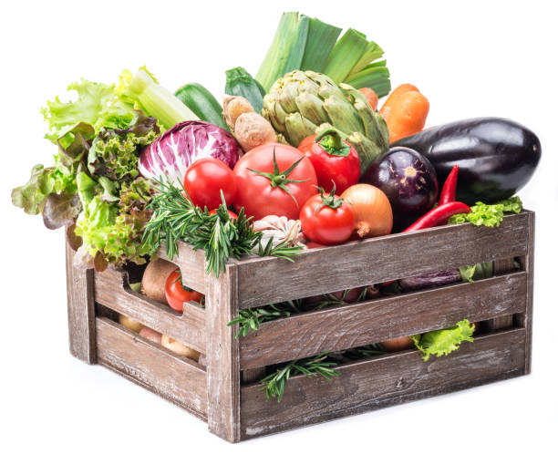 istock Fresh multi-colored vegetables in wooden crate. 928956826