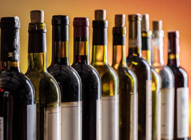 istock Line of wine bottles. 928958290