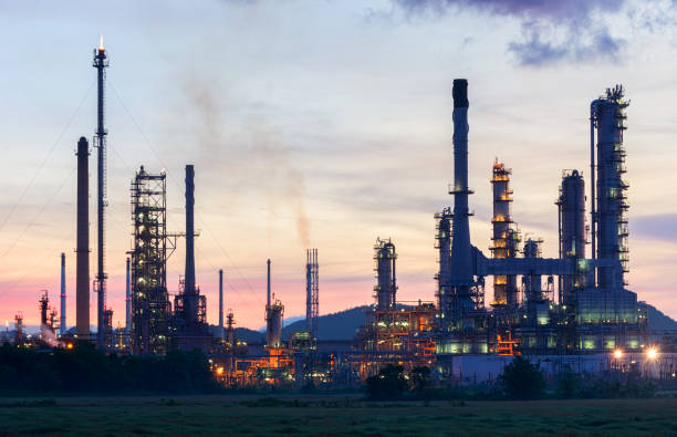 istock Oil refinery at twilight sky 928964330