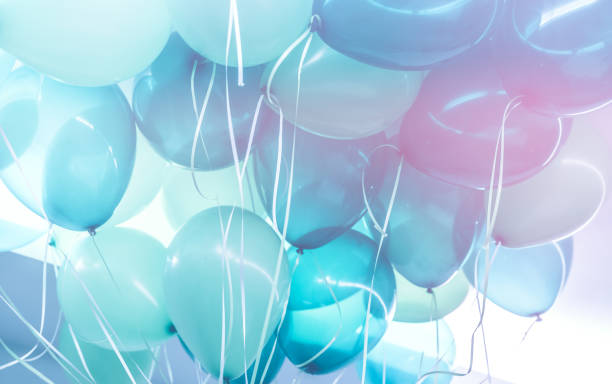 Party background Party background, abstract festive background of a bunch of blue air balloons, happy birthday holiday decoration balloon stock pictures, royalty-free photos & images