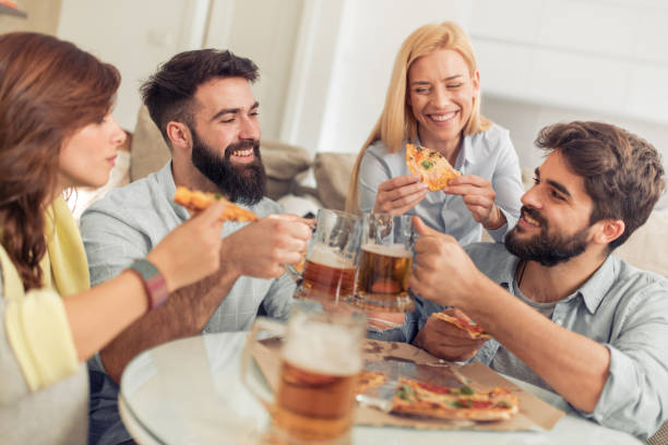 istock Cheerful group of friends having fun at home 928971666