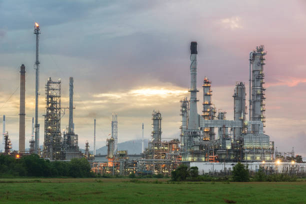 istock Oil refinery at twilight sky 928973000