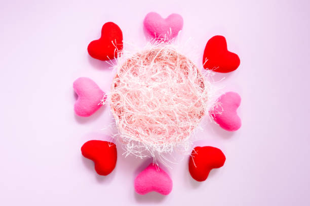 istock Directly Above Shot Of Heart Shape Decorations Over Pink Background 928974442