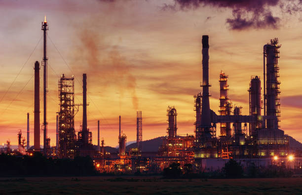 istock Oil refinery at twilight sky, close up to pipe line 928995116