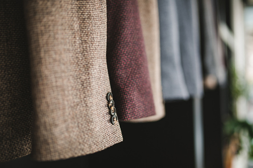 Suit jacket on hanger in tailor shop