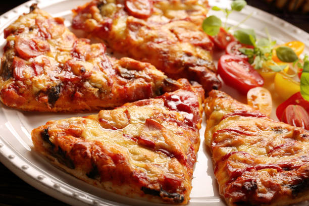 istock Homemade pizza on a white plate 928999130