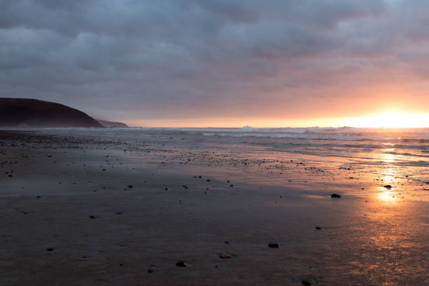 istock Sunset over sea in Legzira Morocco 928999624