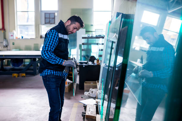 istock Glass,Aluminium and PVC industry workers 929002912