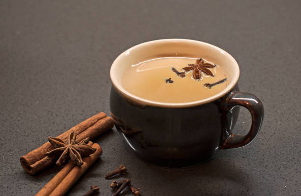 istock Indian tradition milk drink, masala chai tea with spices. 929009468