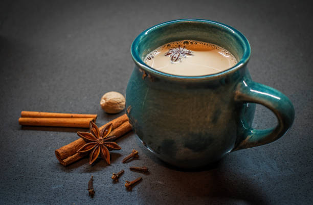 istock Indian tradition milk drink, masala chai tea with spices. 929009602