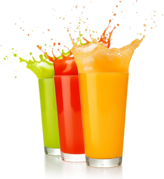 istock fruit juice glasses splashing isolated on white 929023178