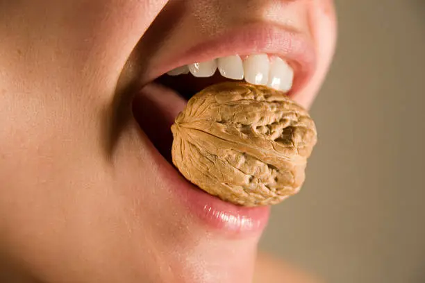 Photo of cracking walnut