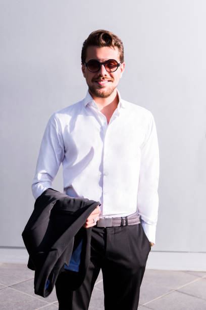 istock Male businessman or worker in black suit 929037158