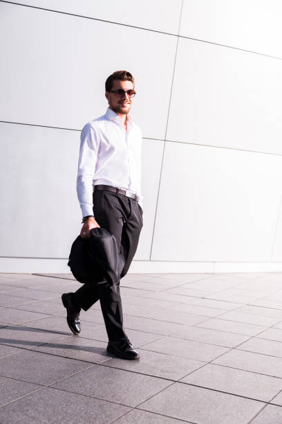 istock Male businessman or worker in black suit 929037170