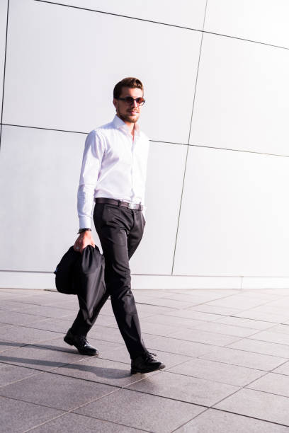 istock Male businessman or worker in black suit 929037182
